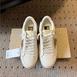 Golden Goose White and Gold Sneakers